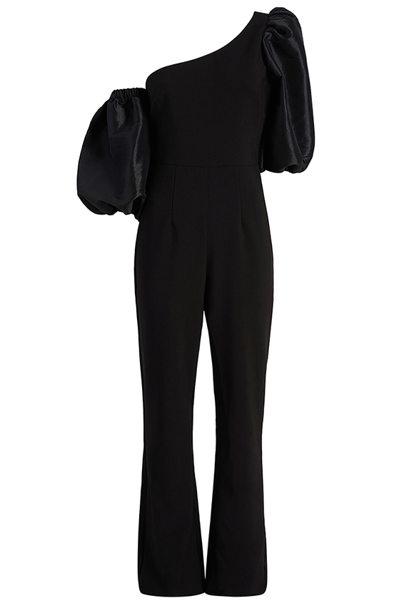 Simple, still-life ghost image of a black romper post-retouch; mannequin removed, clean backdrop, no visible hem-line pins