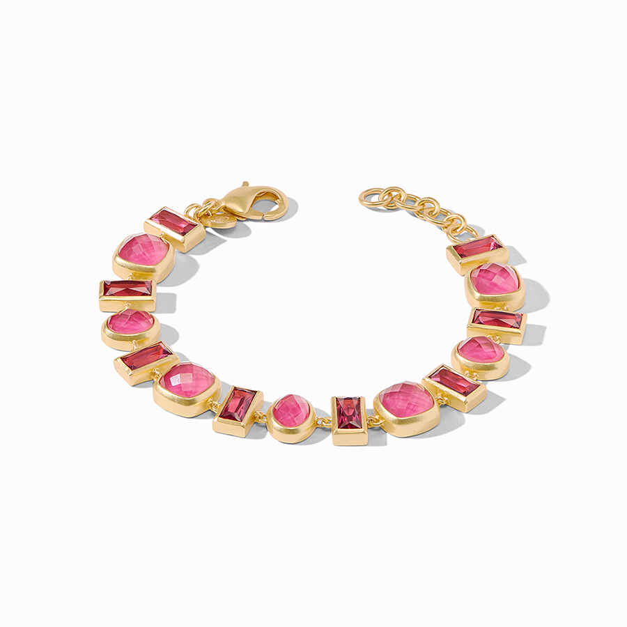 Jewelry product image of a gold bracelet with pink gems with enhanced colors and brighter white background after retouch